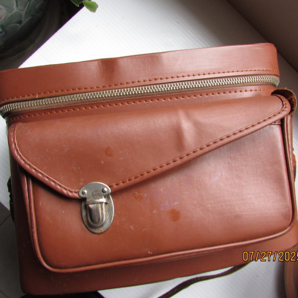 Vintage hard body camera carrier